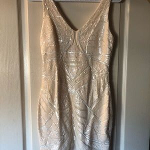 Small white / cream sequinned Bebe dress
